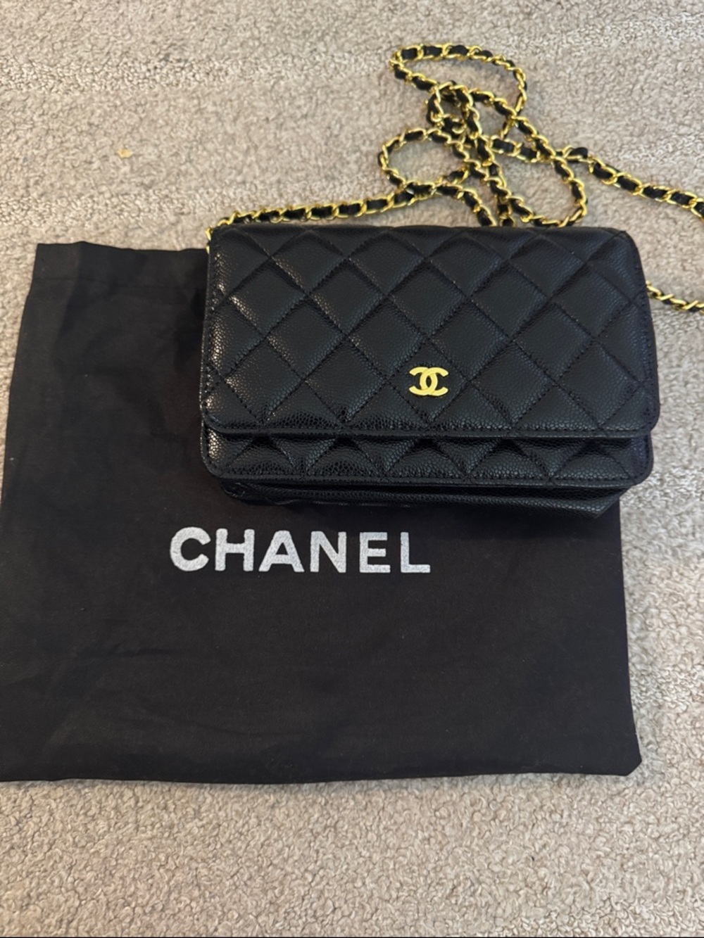 CHANEL Black Quilted Crossbody Wallet-on-Chain with Gold Hardware